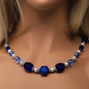 Blue crystal necklace with silver accents and lobster clasp.